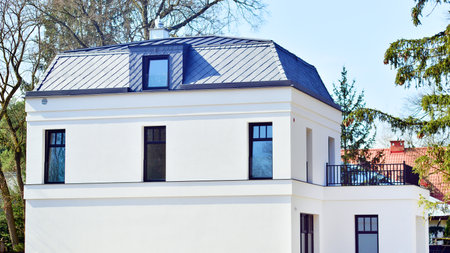 Luxury real estate single family house with white modern facade. A suburban district of single-family homes.の写真素材
