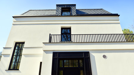 Luxury real estate single family house with white modern facade. A suburban district of single-family homes.の写真素材