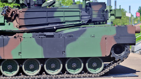 Caterpillar of a modern tank. Undercarriage with tracks and slides of military.の写真素材