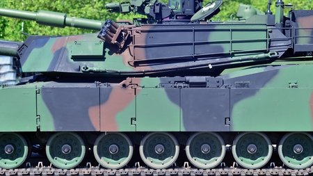 Caterpillar of a modern tank. Undercarriage with tracks and slides of military.の写真素材