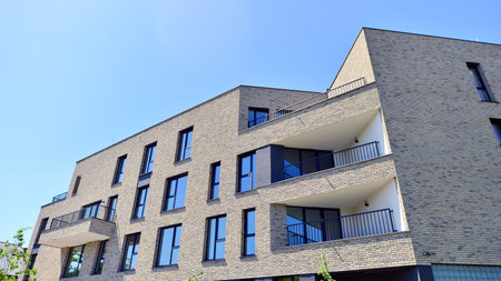 Modern new residential apartment house building complex. Exterior view of modern apartment building....