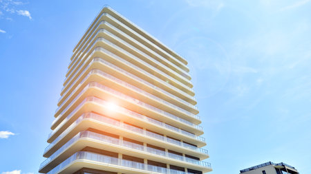 Exterior of a high modern multi-story apartment building - facade, windows and balconies.の写真素材