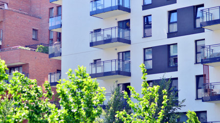 New modern block of flats in green area. complex. New modern block of flats in green area. European...