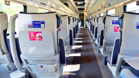 Warsaw, Poland. July 15, 2025. Interior of a passenger train. Empty chairs in the wagon. PKP...