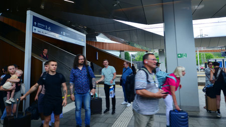 Warsaw, Poland. July 15, 2025. People board a Pendolino train at Warszawa Zachodnia station