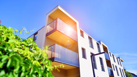 European residential architecture harmonizing with nature. Eco-friendly living in city with greens....