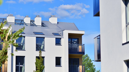 European residential architecture harmonizing with nature. Eco-friendly living in city with greens....