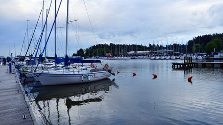 Wilkasy, Poland. 24 August 2025. Marina Wilkasy and boats moored above lake Niegocin near Gizycko.のeditorial素材