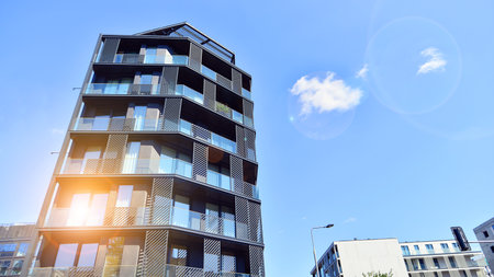 Architectural details of modern apartment building. Modern european residential apartment building...