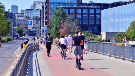 Warsaw, Poland. 15 August 2025. Tourists and residents crossing crowded Swietokrzyski Bridge. There...