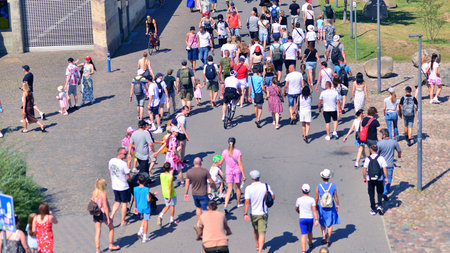Warsaw, Poland. 15 August 2025. Tourists and residents crossing promenade along the Vistula river...