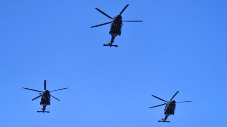 Warsaw, Poland. 15 August 2025. Helicopters take part in a military parade on Polish Army Day.
