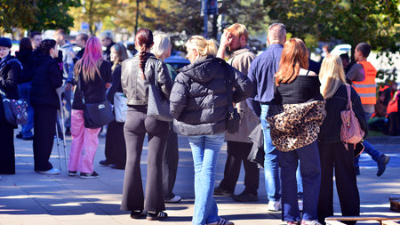 Warsaw, Poland. 26 September 2025. The youth are watching climate activists of the group "Last Generation" set up a camp in front of the Polish Parliament.のeditorial素材