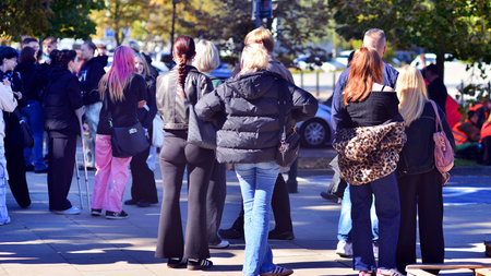 Warsaw, Poland. 26 September 2025. The youth are watching climate activists of the group "Last Generation" set up a camp in front of the Polish Parliament.のeditorial素材