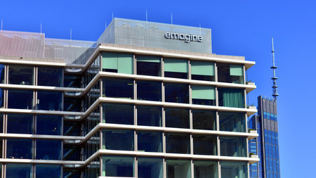 Warsaw, Poland. September 21, 2025. Urban landscape. Neon sign with the inscription: emagine. Office...