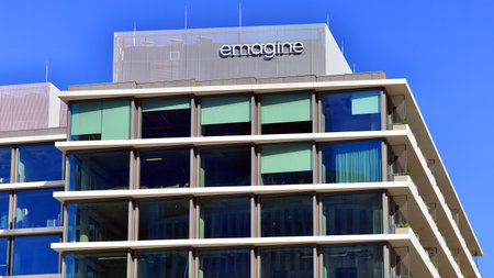 Warsaw, Poland. September 21, 2025. Urban landscape. Neon sign with the inscription: emagine. Office...