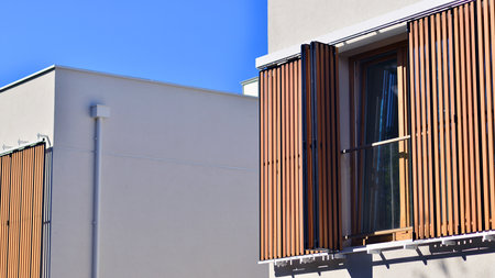 Newly built terraced houses in a residential area. Modern terraced houses on the outskirts of the...