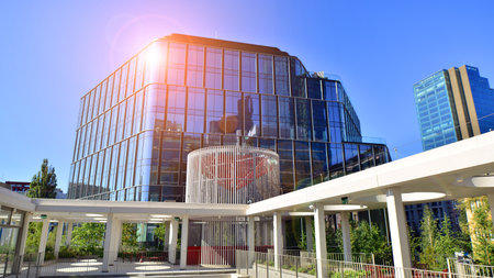 Modern luxury office building.The structure features a glass and concrete walls, showcasing...