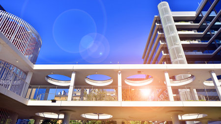 A modern corporate hub in the city center. The structure features a glass and concrete walls,...