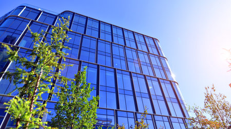 Modern luxury office building.The structure features a glass and concrete walls, showcasing...