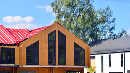 Single-terracedfamily houses under construction in an development estate.の写真素材