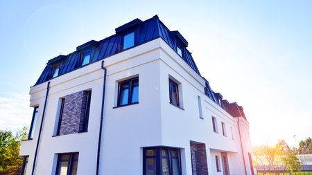 Newly built terraced houses in a residential area. Modern terraced houses on the outskirts of the city.の写真素材