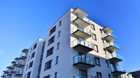 New multistory modern apartment buildings under construction in sunny day.の写真素材