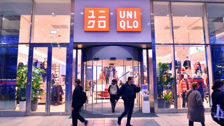Warsaw, Poland. 4 November 2025. People walk along the sidewalks in the vicinity of large shop...