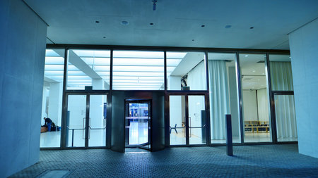 Warsaw, Poland. 4 November 2025. City life after dark. Museum of Modern Art with large glass fronts....