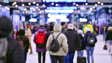 Warsaw, Poland. 28 November 2025. Commuters going through the underground passage hall at Warszawa...