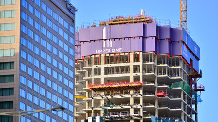 Warsaw, Poland. January 5, 2026. Construction of the Upper One skyscraper. A construction crane in...
