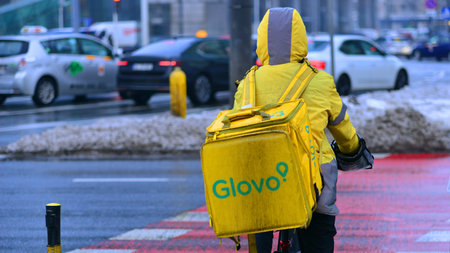 Warsaw, Poland. 15 January 2026. An unidentified Glovo bike courier seen on the street