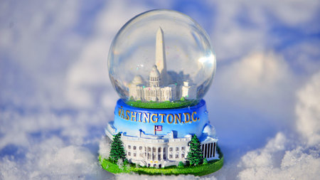 Warsaw, Poland. February 1, 2026. The White House, Capitol and Washington Monument in a snow globe.のeditorial素材