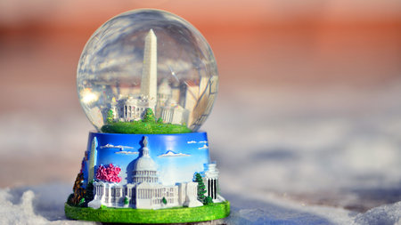 Warsaw, Poland. February 1, 2026. The White House, Capitol and Washington Monument in a snow globe.のeditorial素材