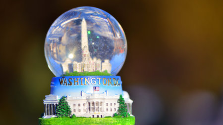 Warsaw, Poland. February 1, 2026. The White House, Capitol and Washington Monument in a snow globe.のeditorial素材