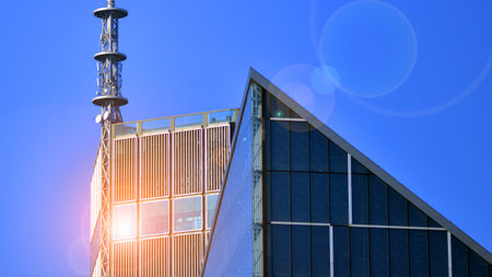The glass exterior wall of the skyscrapers in the financial center. Tall glass skyscrapers in the...