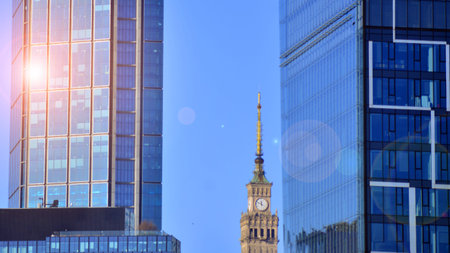 The glass exterior wall of the skyscrapers in the financial center. Tall glass skyscrapers in the city center.の写真素材