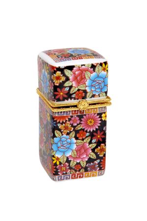 Porcelain toothpick holder decorated with bright colourful flowers, isolated on white backgroundの写真素材