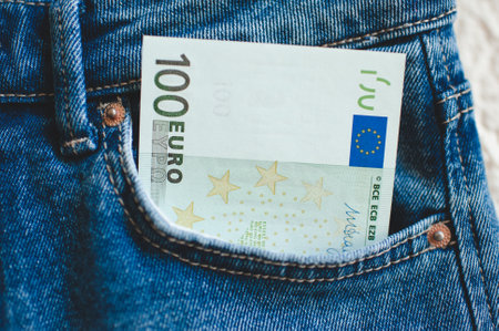 Denim pants with moneys cash in pocket closeupの写真素材