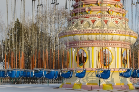 Empty carousel in the park in winter  Krasnoyarskの写真素材