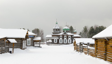 Winter village street and the churchの写真素材