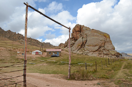 Mongolian yurt and small house near the mountainsのeditorial素材