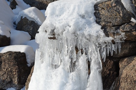 Curlicue and icicles on the shore of Lake Baikal. Siberia, Russiaの写真素材