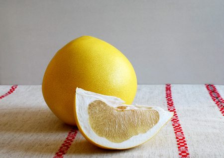 Pamela fruit on linen tablecloth White backgroundの写真素材