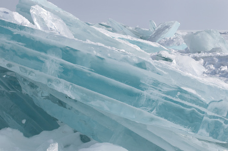 Pure ice of Baikal. Blue floes in sunlight