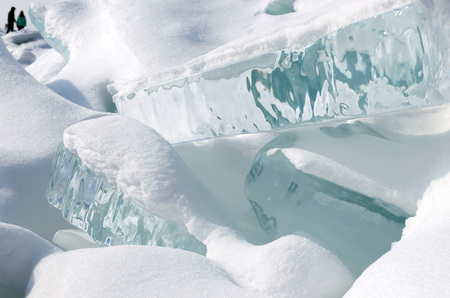 Lake Baikal in winter. Close-up view on ice hummock with pure blue floes