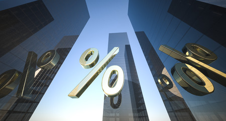 golden percent sign on a background of office skyscrapers. The sign is reflected in buildingsの写真素材