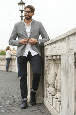 fashion young man beauty walk in a cityの写真素材