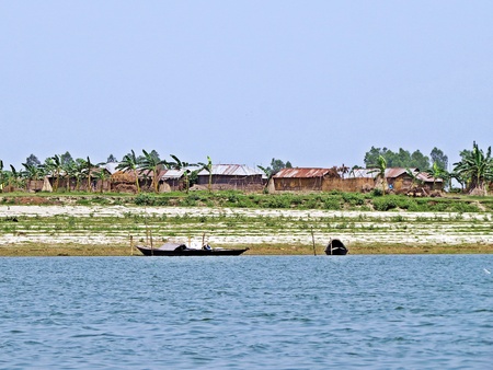 temporary settlement on one of many everchanging sandy islands at Jamuna River, Bangladeshの写真素材