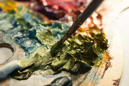 Artist Palette Artist oil colour palette mixing colour beautiful color mix creative art close up microの写真素材